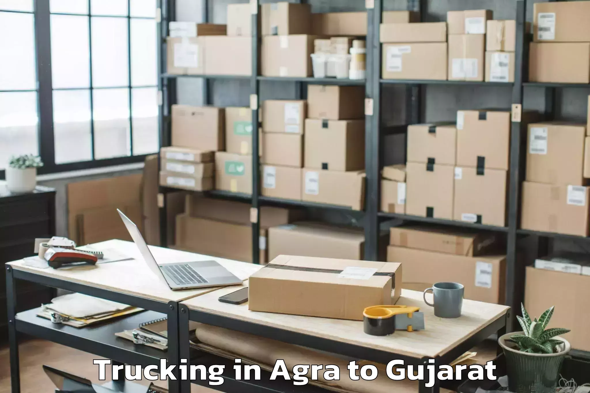 Top Agra to Gujarat Ayurved University Jam Trucking Available